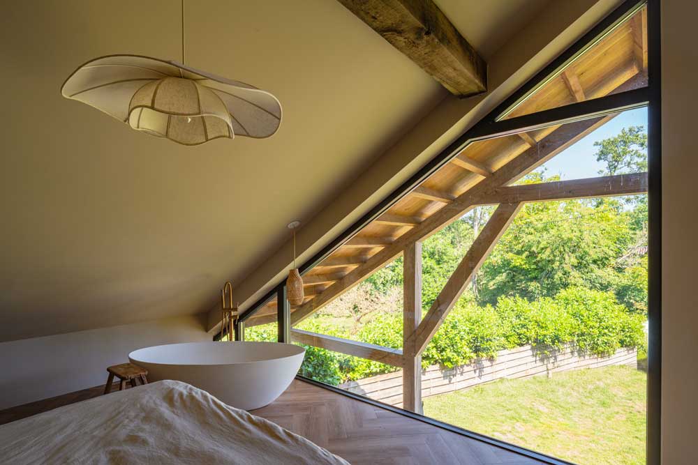 Houten villa met glas Loosdrecht